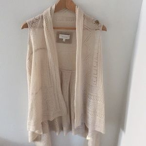 Angel of the North Anthropologie) knit vest.